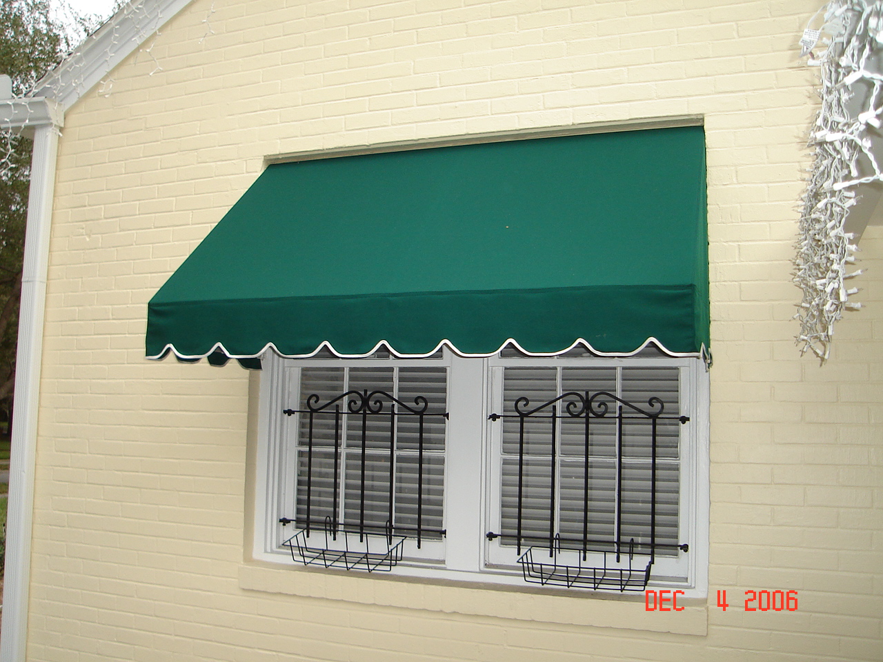 Residential awning - residential awning green with white braid